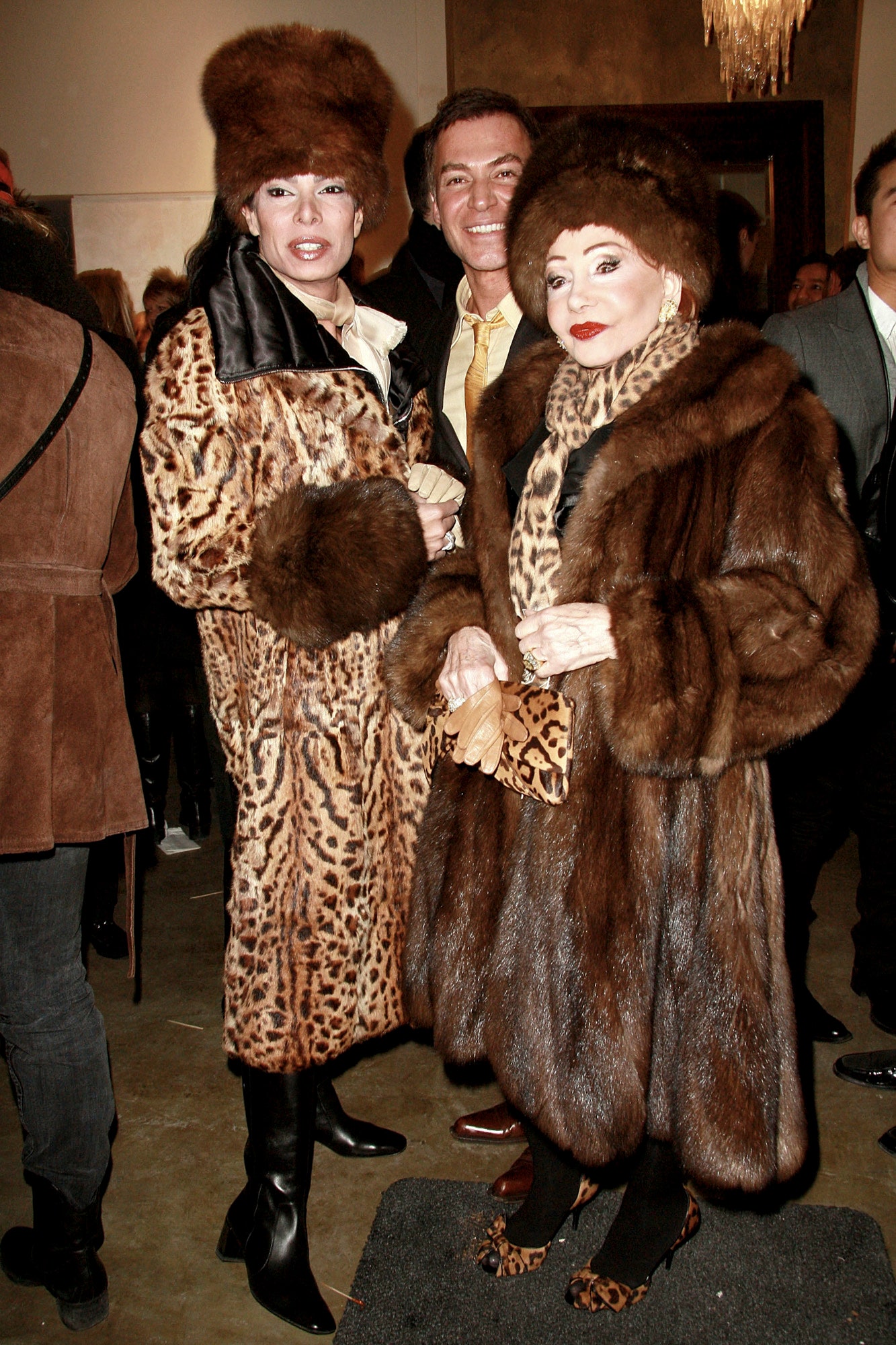 Image may contain Clothing Coat Footwear High Heel Shoe Lamp Adult Person Fur Hat Accessories and Formal Wear